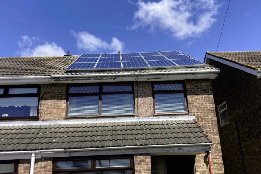 Solar panels with mesh on the roof.